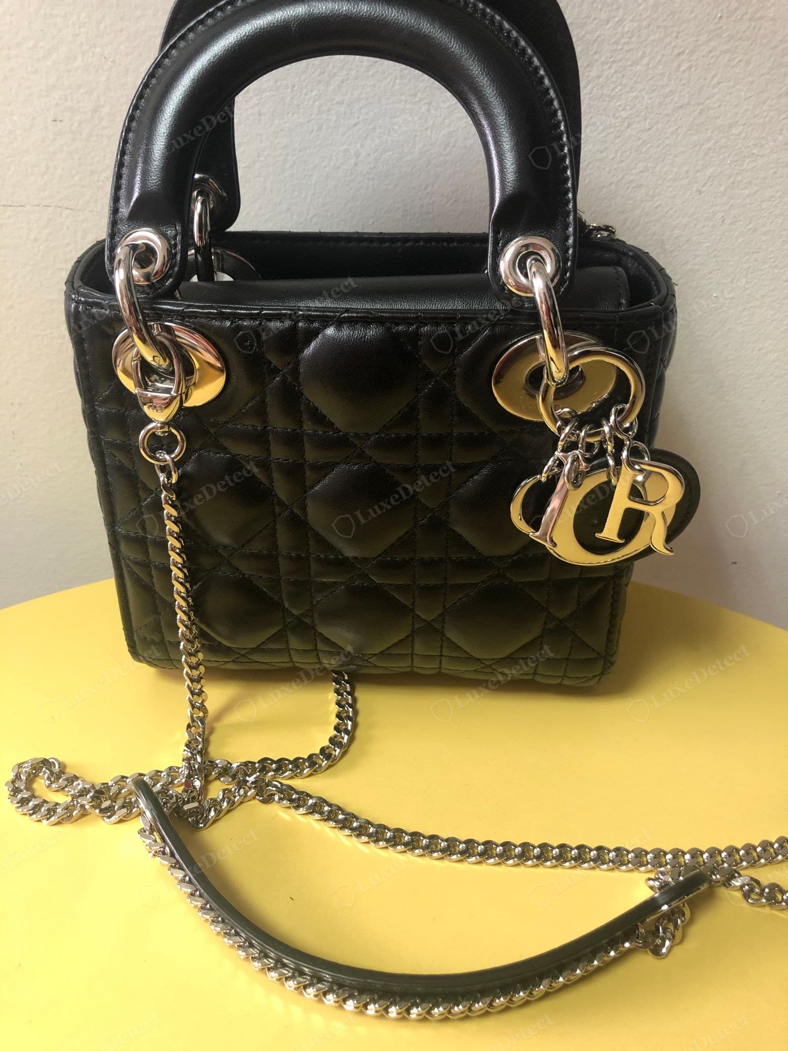Genuine Lady Dior D-I-O-R charms — the silver letter charms hanging from the handle ring of a Mini, each on its own jump ring, all the same size and matching the bag's other hardware