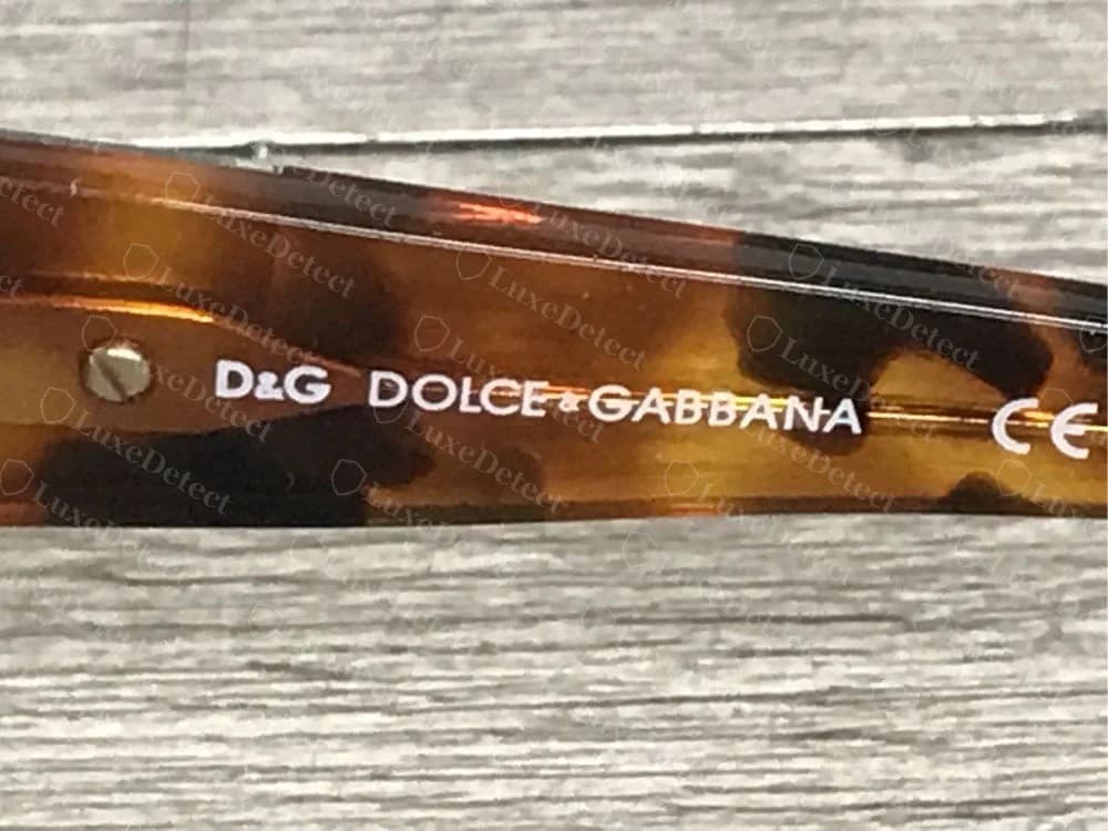 Genuine older D&G-line temple: the D&G logo, the full DOLCE&GABBANA wording and the CE mark on tortoiseshell acetate