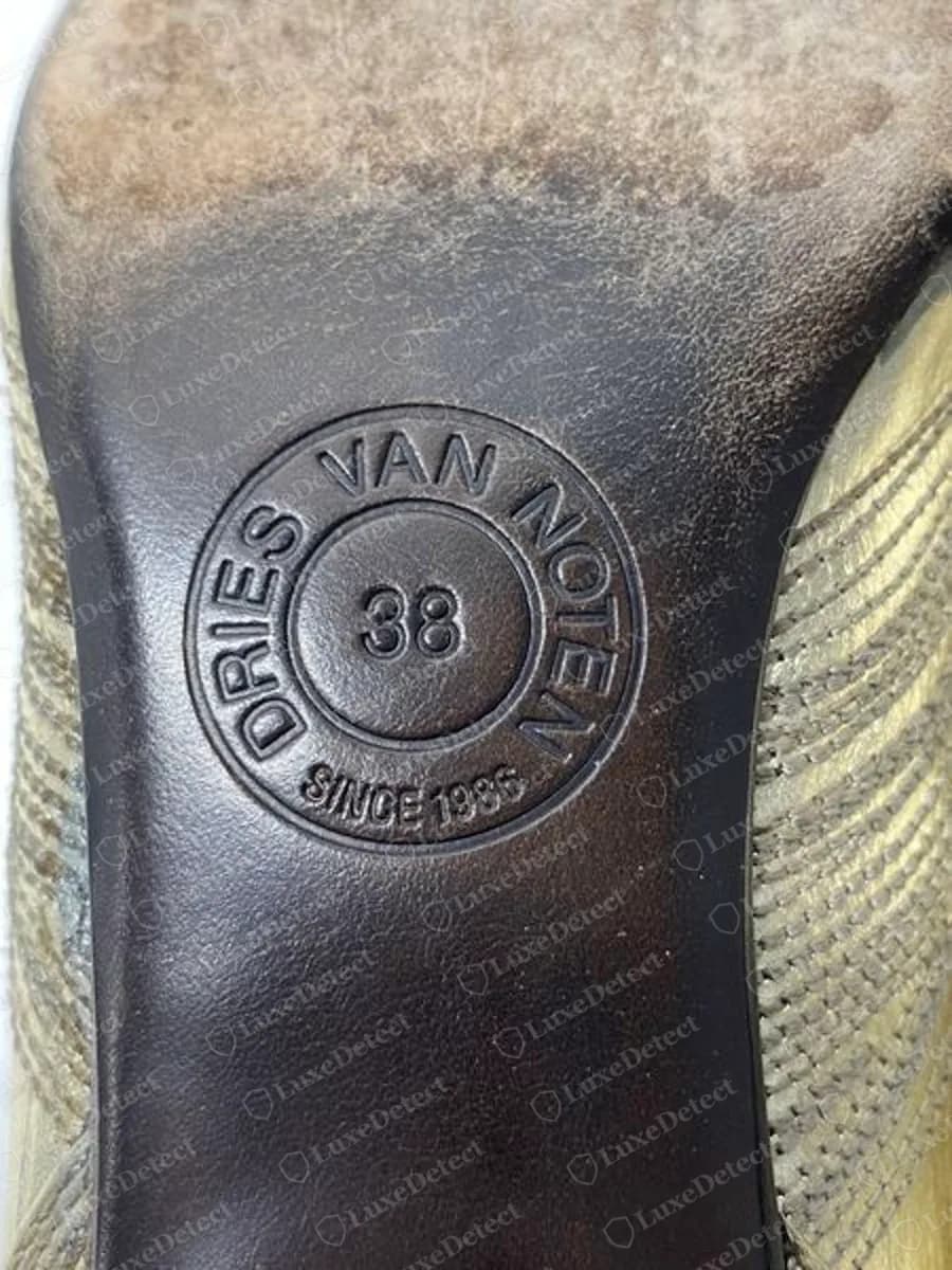 Genuine Dries Van Noten leather sole with a round embossed stamp reading DRIES VAN NOTEN around the edge, SINCE 1986 along the bottom and the size 38 in the centre