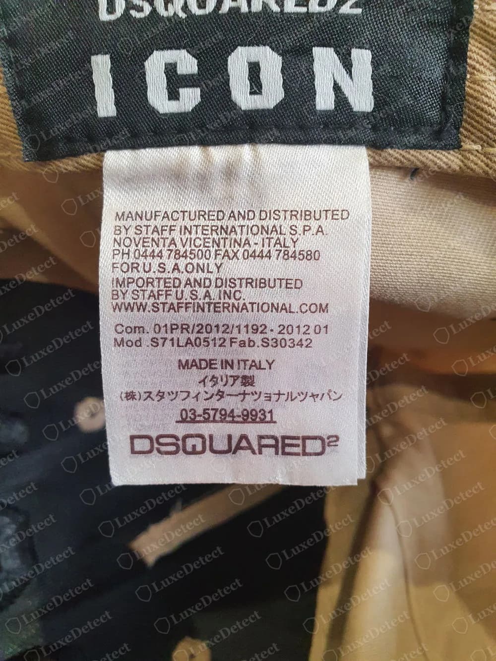 Genuine older Dsquared2 ICON cap interior: black woven label reading DSQUARED2 ICON above a white label that names Staff International for the U.S.A., with Com. and Mod. lines, MADE IN ITALY and DSQUARED2