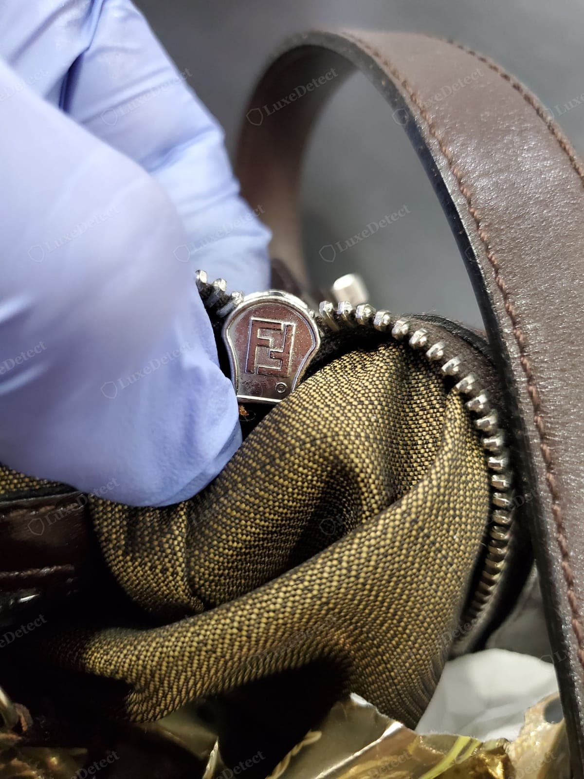 Genuine Fendi Baguette zipper — the reverse of the pull and the stopper cleanly marked, a smooth action, tape matched to the lining
