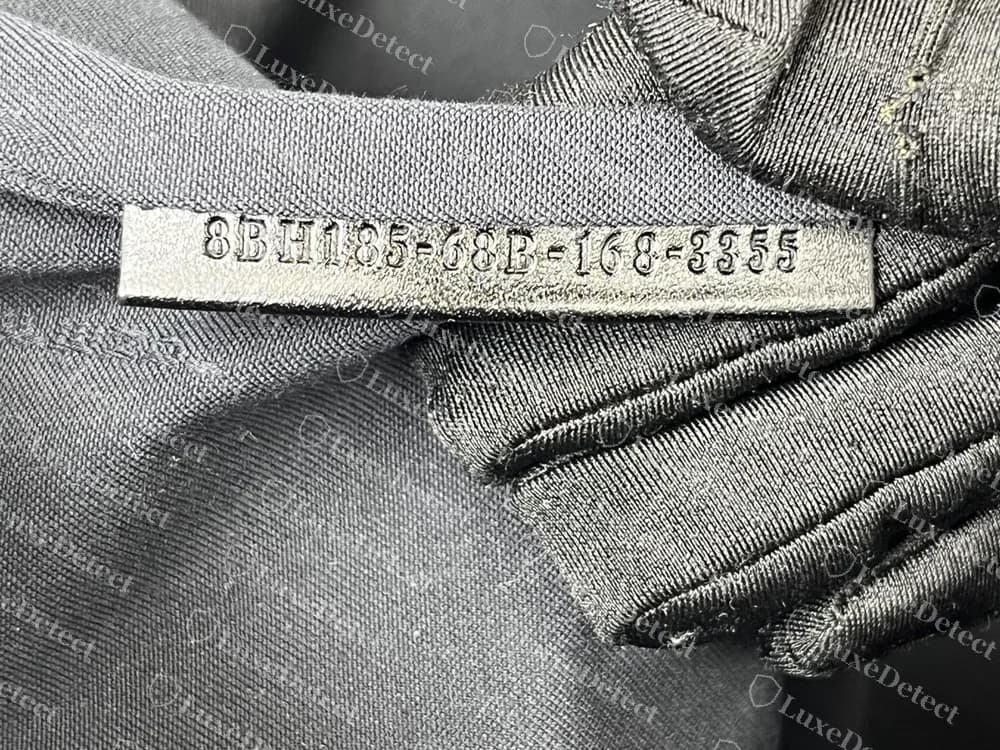 A genuine Fendi tote with the code embossed on a narrow leather strip inside the lining: 8BH185-68B-168-3355