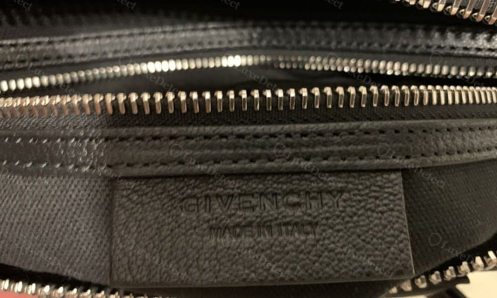 Genuine Givenchy Antigona interior tab — "GIVENCHY / MADE IN ITALY" heat-pressed cleanly into the leather patch, correct font and even registration