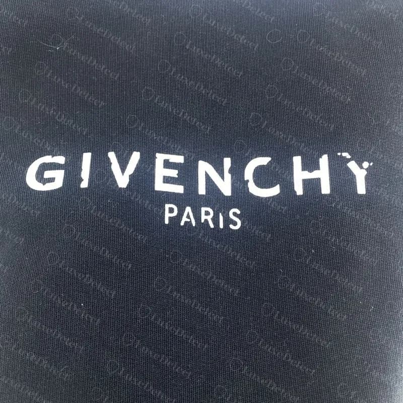Genuine Givenchy logo hoodie: the print is deliberately chipped, with broken letter edges and a split Y.