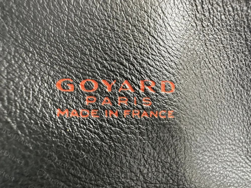 Genuine Goyard Anjou leather-side stamp reading GOYARD PARIS MADE IN FRANCE, pressed into the smooth calfskin
