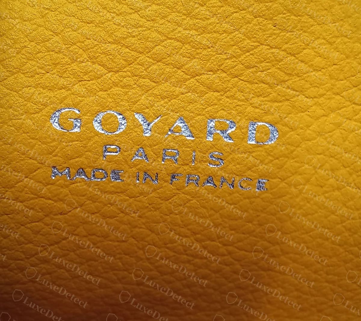 Genuine Goyard Soft Saigon Mini interior: GOYARD PARIS MADE IN FRANCE in silver foil on yellow pebbled leather lining