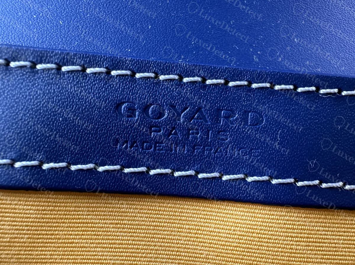 Genuine Goyard Saigon Structure interior: GOYARD PARIS MADE IN FRANCE blind-stamped on the leather strip above the ochre canvas lining
