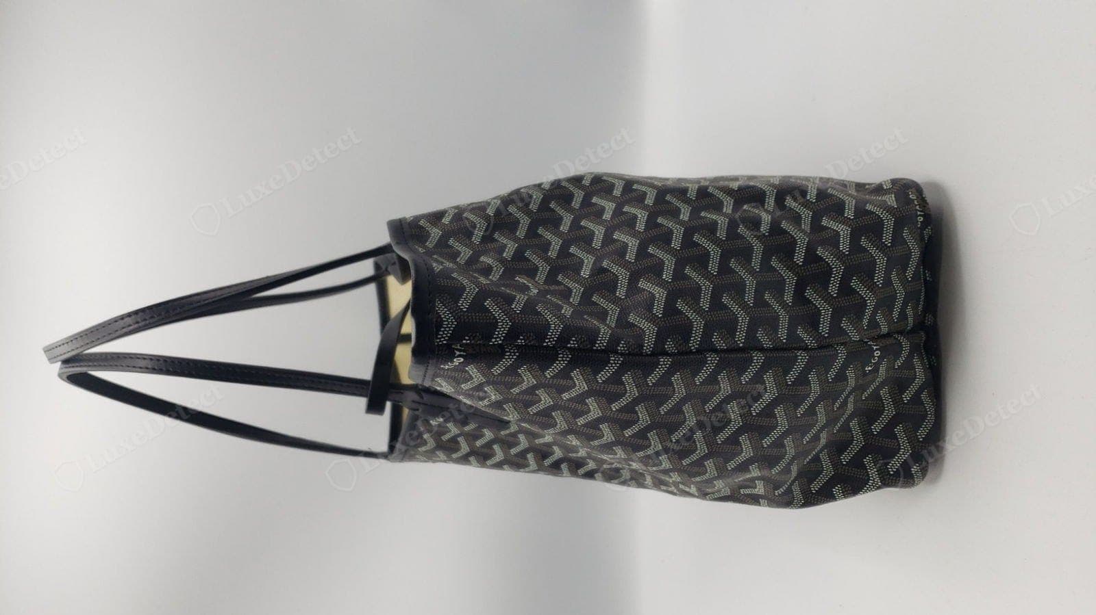 Counterfeit Goyard Saint Louis overall — a small-scaled, mechanically regular chevron across the whole panel, a slumped shape and a thin leather trim