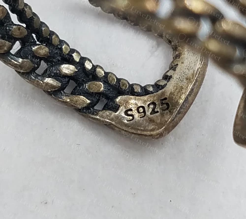 Counterfeit Gucci open ring with S925 stamped on the end, no lozenge and no Ag