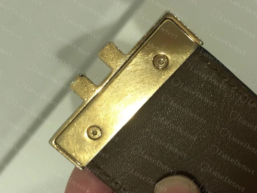 Genuine key-shaped hardware bracket, step-notched top edge, corner screws, and the same finish quality as the lock plate