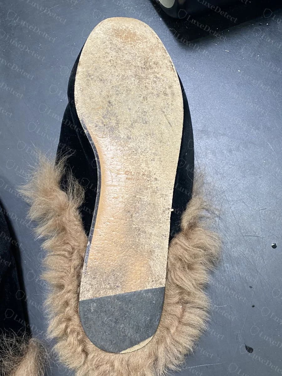 Authentic Gucci Princetown interior fur-collar tab, stitched in with cream thread, stamped "GUCCI / made in italy" in lower case matching the outsole