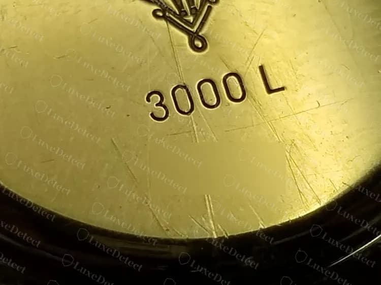 Genuine Gucci 3000 L caseback: crest above the model line 3000 L, serial blurred