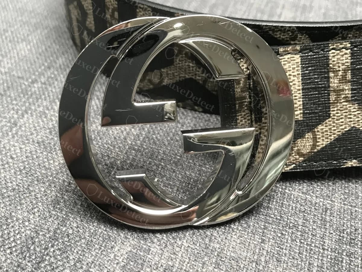 Echte Gürtelschnalle mit ineinandergreifendem G aus poliertem Metall in Silberton an einem Riemen aus GG Supreme