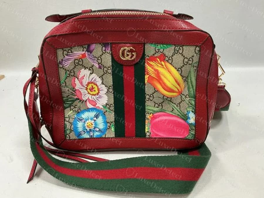 A second Flora-print crossbody bag in a comparable silhouette, useful for comparing panel placement and trim proportions against the reference above