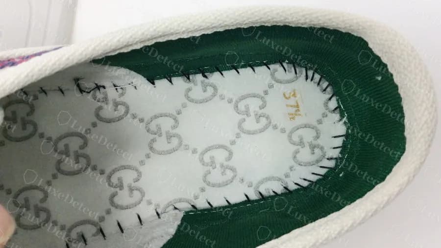 Genuine Gucci Tennis 1977 insole with a GG print, stitched around the edge, with a handwritten size mark in gold