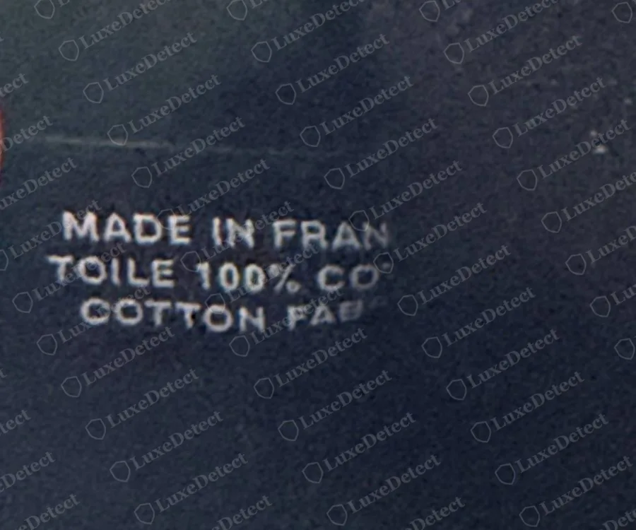 Texte imprimé sur la toile intérieure d'un Herbag Zip authentique, MADE IN FRANCE, TOILE 100% COTON, COTTON FABRIC, en capitales blanches