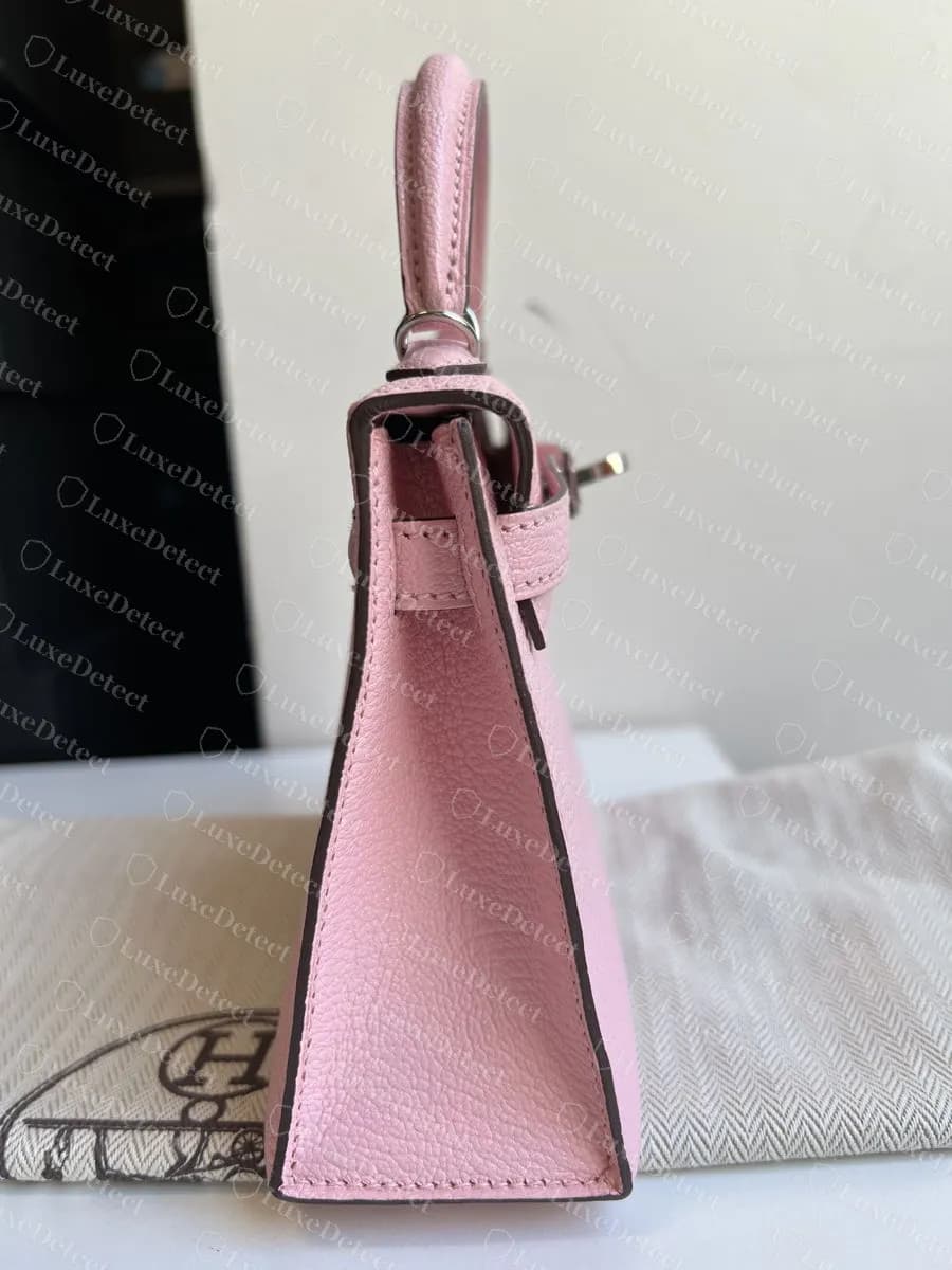 Genuine Hermès Mini Kelly II in Chèvre, side profile: steep trapezoid body, narrow gusset, straight Sellier edges and a tall handle for the size