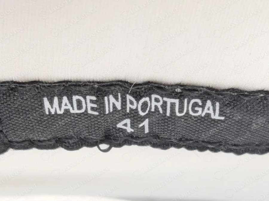Genuine Lanvin Curb black woven interior tape reading MADE IN PORTUGAL 41 on a white lining