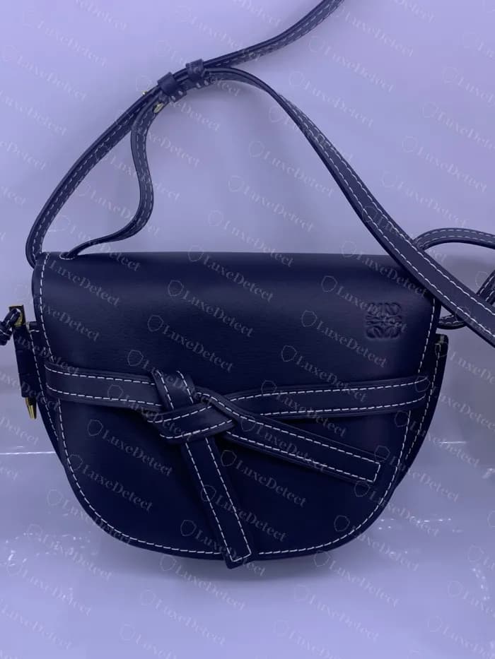 Genuine Loewe Gate in navy calfskin with the knotted leather tie and a blind-embossed Anagram on the flap