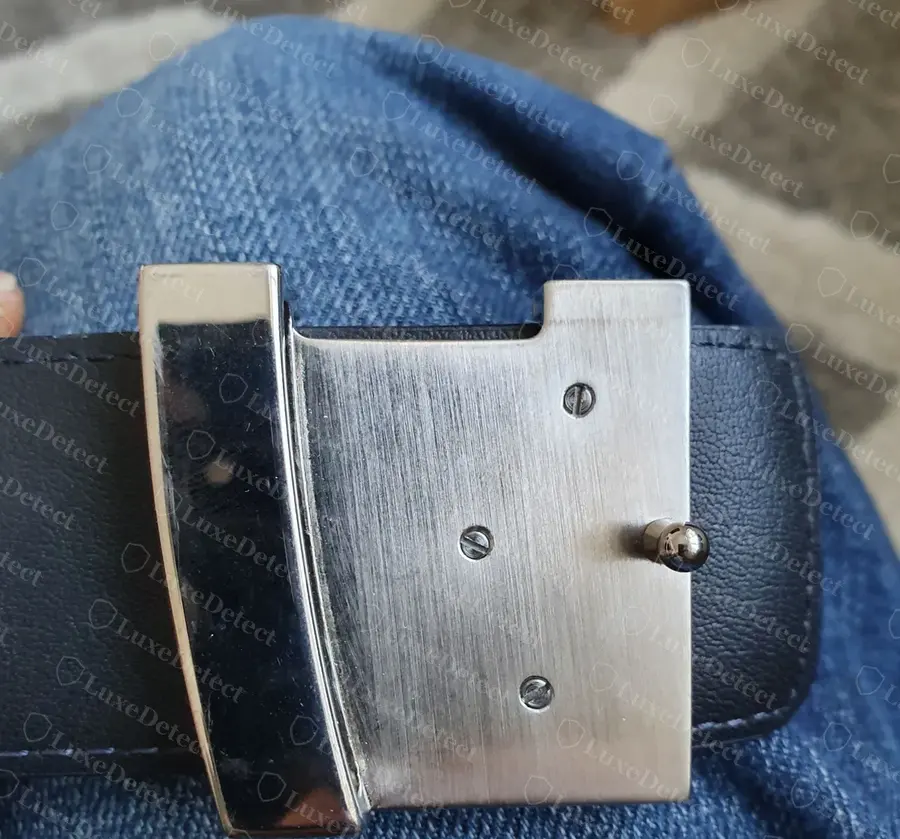 Genuine Louis Vuitton Initiales buckle back in silver: brushed back plate with small flat-head screws and the strap peg, and a plain polished keeper bar with no lettering