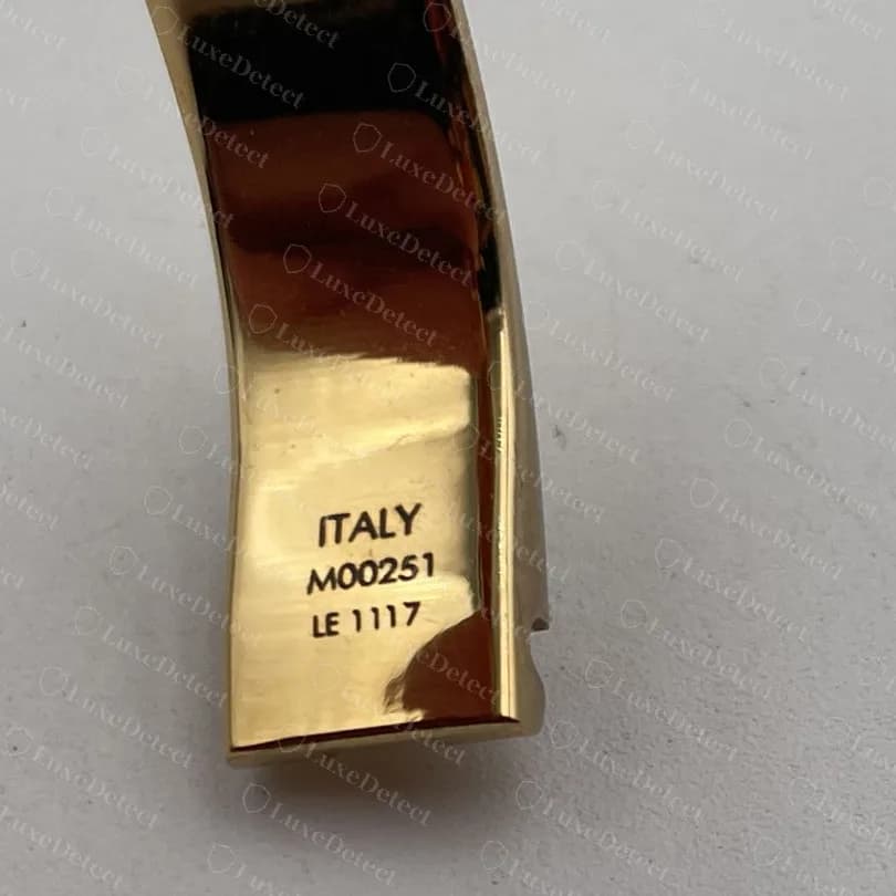 Authentic Nanogram cuff hinge stamp: ITALY, reference M00251, date code LE 1117, finely engraved and small on the hinge face