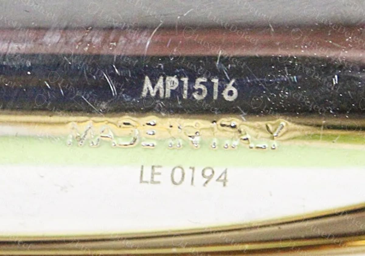 Authentic twist bangle stamp: reference MP1516, MADE IN ITALY with normal word spacing, and date code LE 0194