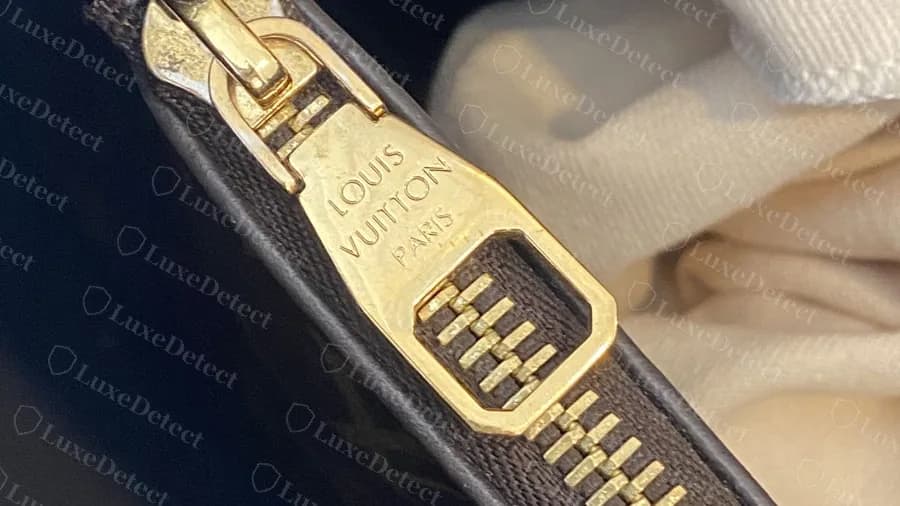 Genuine Neonoe inside zip pull in gold, engraved LOUIS VUITTON PARIS over three lines