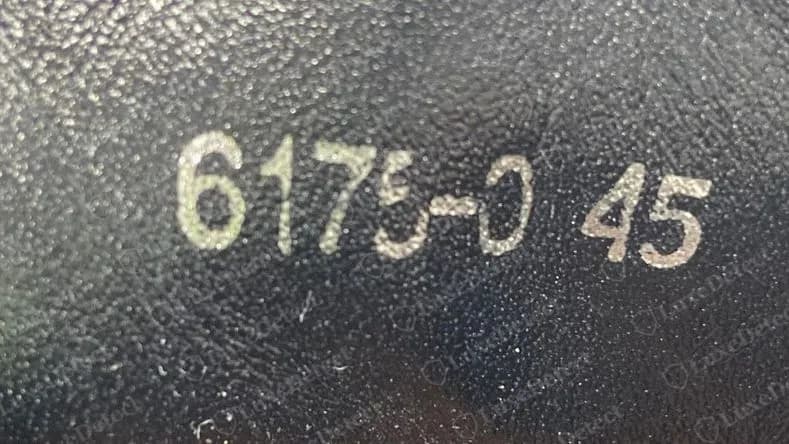 Counterfeit Louis Vuitton shoe stamp reading 6175-0 45, a hyphen inside the number group and no letter pair