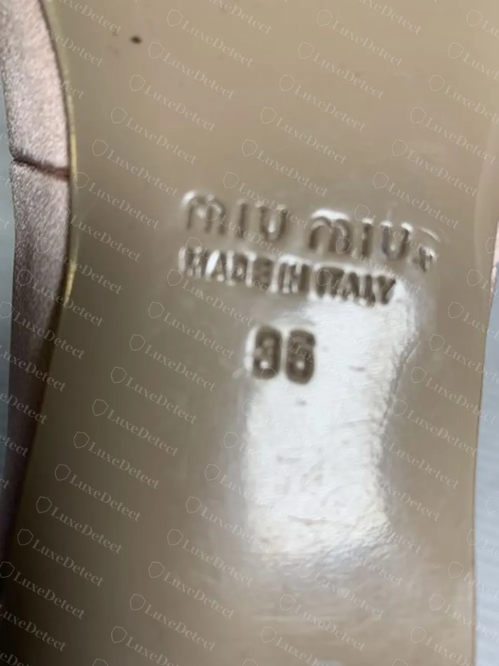 Authentic Miu Miu satin ballerina sole: "miu miu", "MADE IN ITALY" and size "36" pressed into the leather