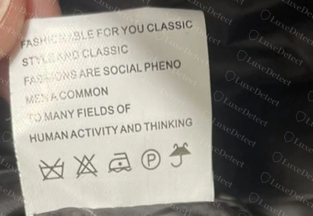 A care label from a counterfeit Moncler jacket: slogan-style English text and five care symbols, with no style code or production code at all