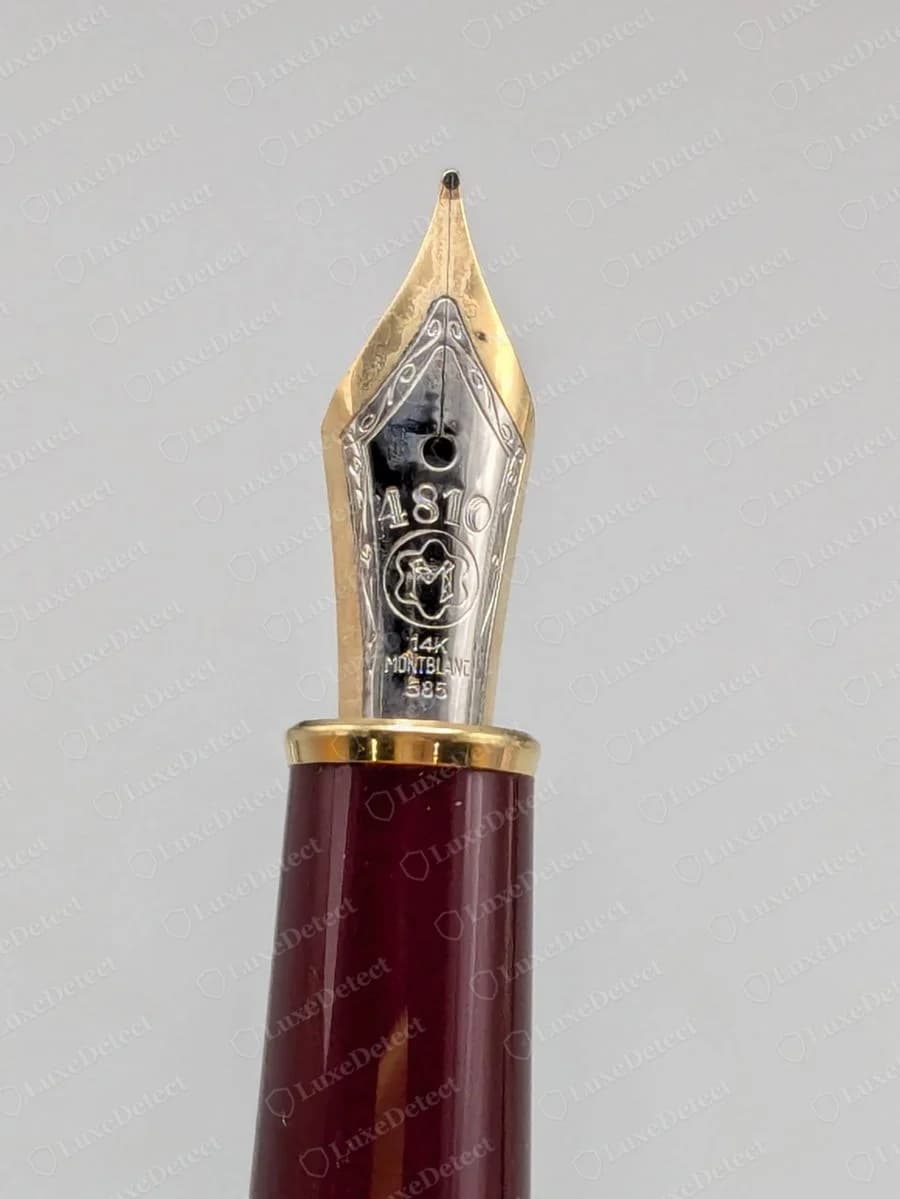 Genuine Montblanc Meisterstück gold nib engraved 4810 above a circular emblem, with 14K MONTBLANC and 585 below