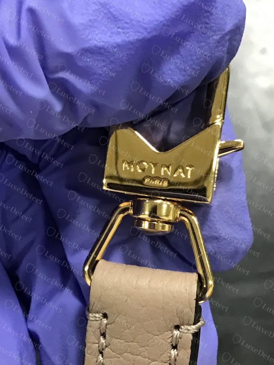 Genuine Moynat Gabrielle gold-tone swivel strap clip engraved MOYNAT over PARIS with a notched M-shaped top
