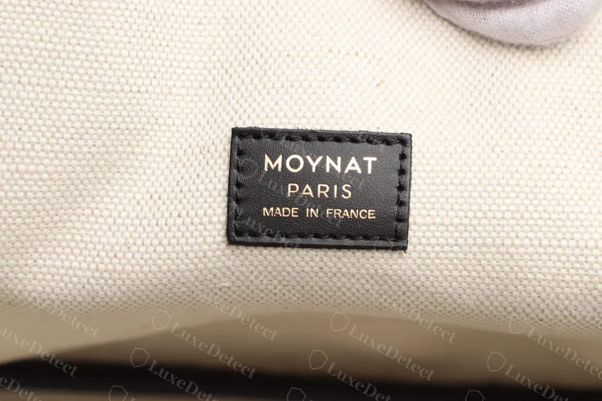 Genuine Moynat Oh! Tote leather label reading MOYNAT PARIS MADE IN FRANCE, stitched to the ecru canvas lining