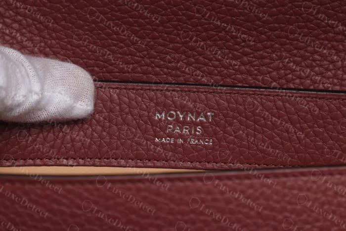 Moynat Réjane interior stamp reading MOYNAT PARIS MADE IN FRANCE in three centred lines above the interior zip pocket