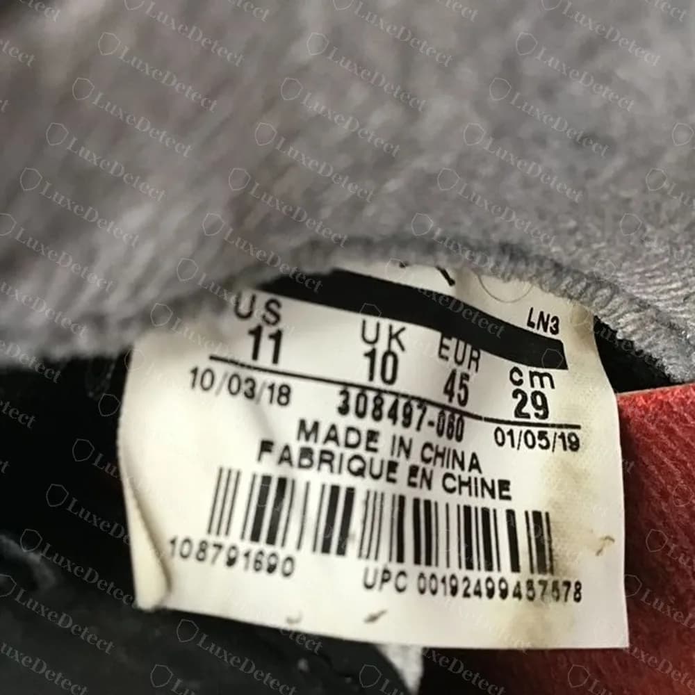 Echtes Etikett Bred 2019: 308497-060, LN3, Made in China, älteres Barcode-Layout, Daten aus 2018 und 2019 und eine UPC, die mit 0019249945 beginnt