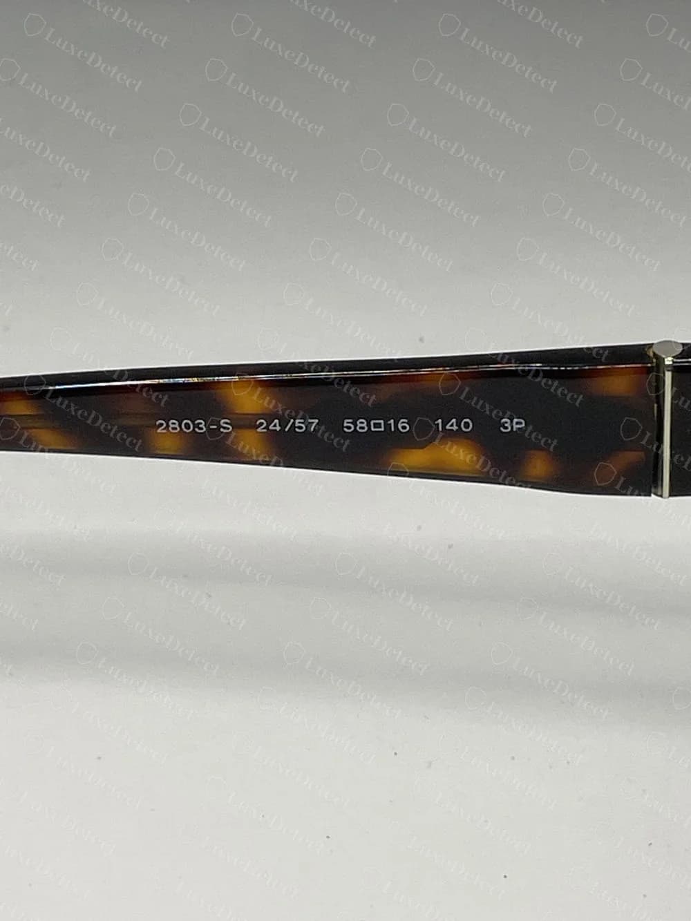 Genuine Persol 2803-S tortoise temple stamped 2803-S 24/57 58, a small square, 16, 140, 3P in white print on the inside of the temple