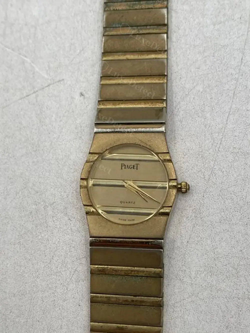 A fake with the identical Polo silhouette and correctly printed dial text.