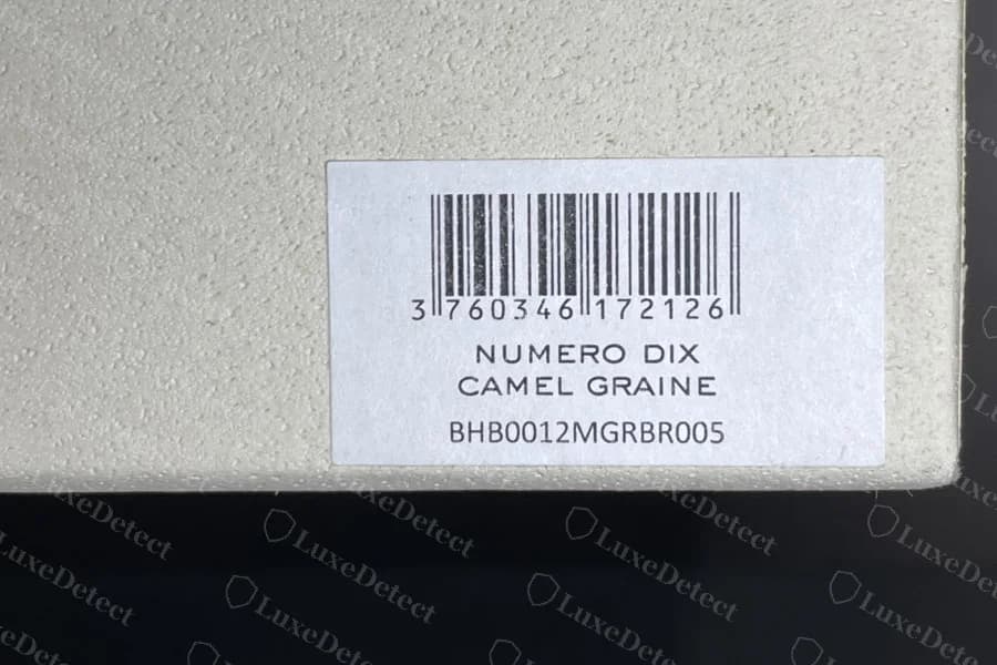 Counterfeit Numéro Dix box label reading NUMERO DIX, CAMEL GRAINE with a barcode and reference code