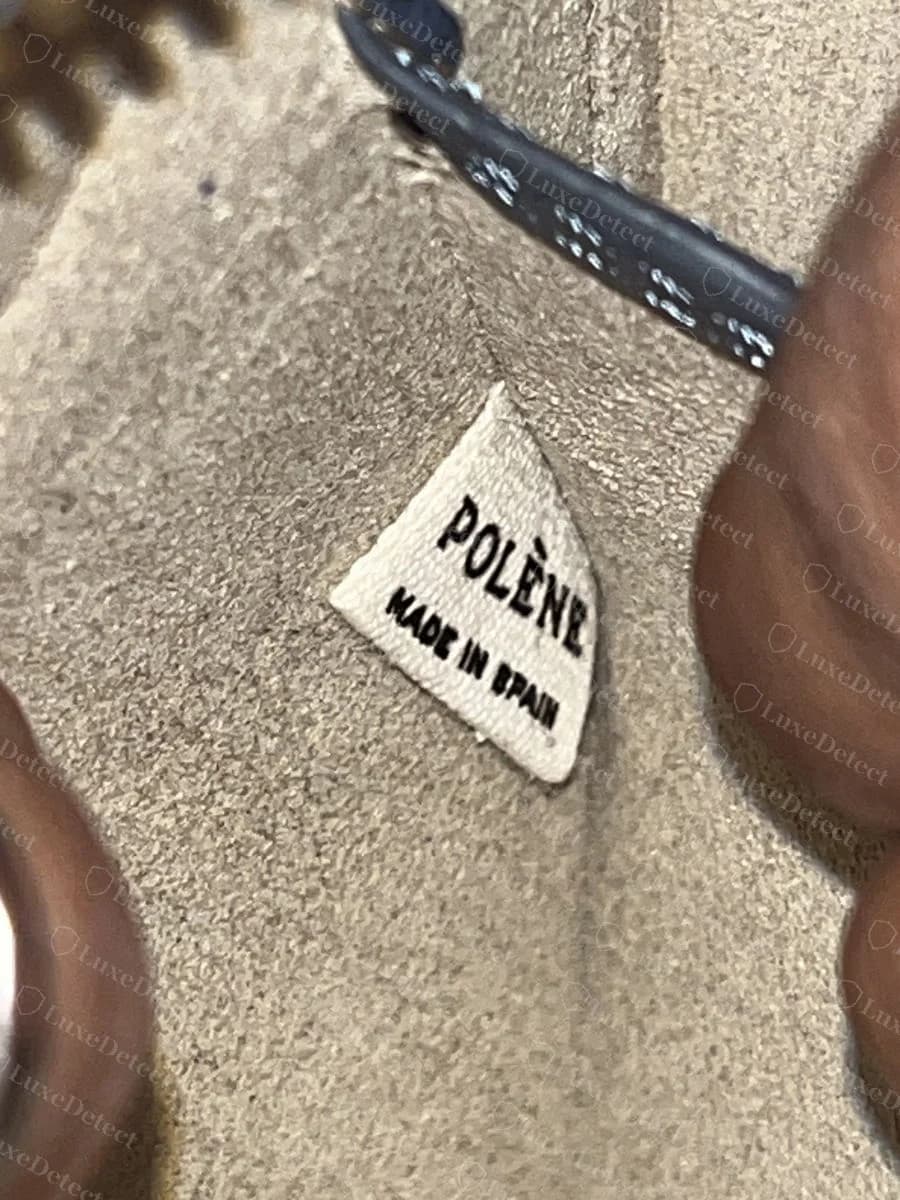 Genuine Numéro Dix fabric label, a woven fold reading POLÈNE and MADE IN SPAIN, sewn into the lining seam