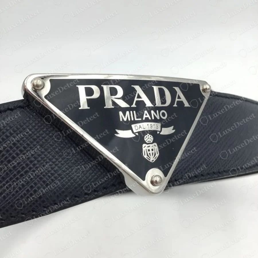 Authentic Prada Saffiano belt with the enamelled triangle buckle: PRADA, MILANO, DAL 1913 banner and crest