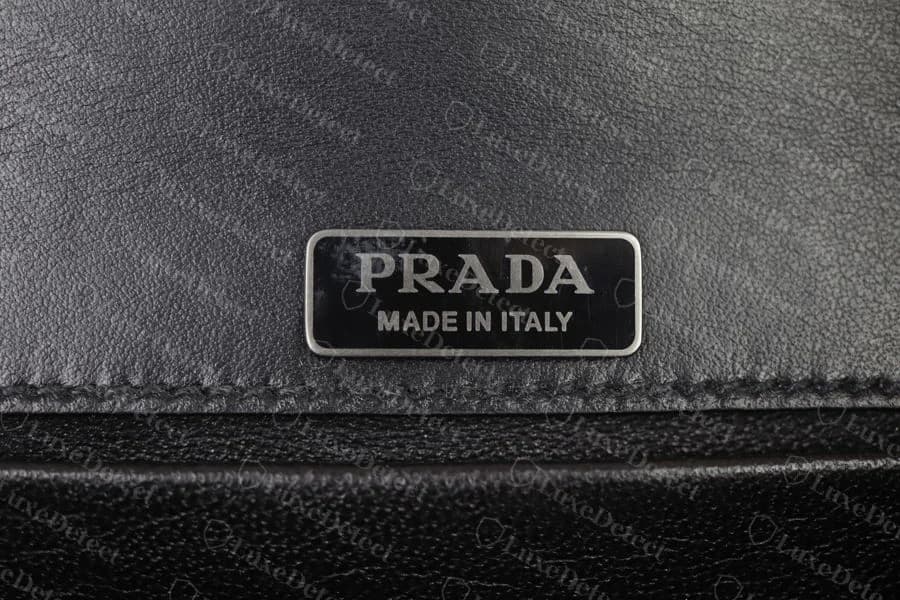 Genuine Cahier interior nameplate: PRADA MADE IN ITALY, squarely mounted with clean stitching