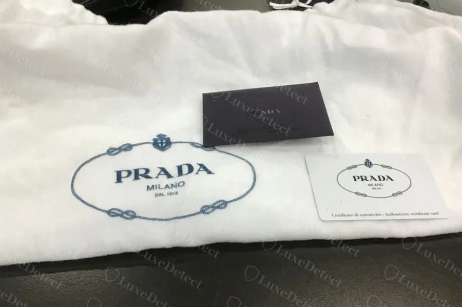 Authentic Cleo packaging: dust bag, authenticity certificate envelope, and certificate card