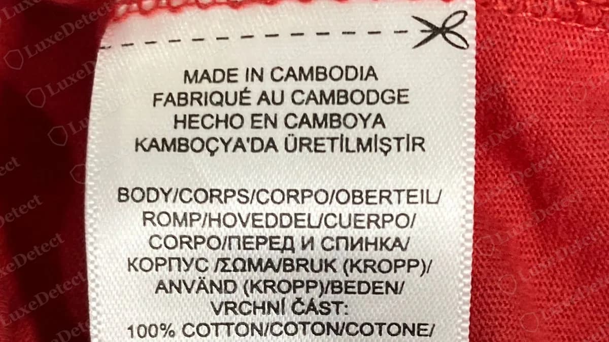 Genuine Polo Ralph Lauren side-seam care label: country of manufacture in four languages, then body fibre content in many languages