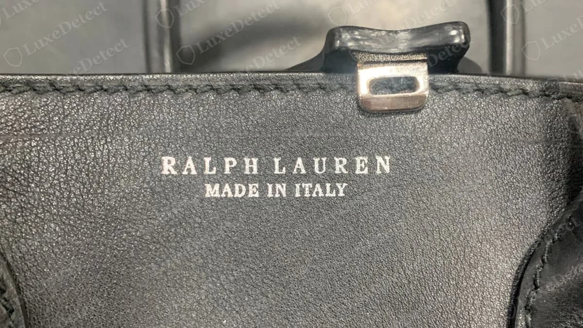 Genuine Soft Ricky heat stamp inside the top edge: RALPH LAUREN over MADE IN ITALY in spaced capitals, foil-stamped on black leather