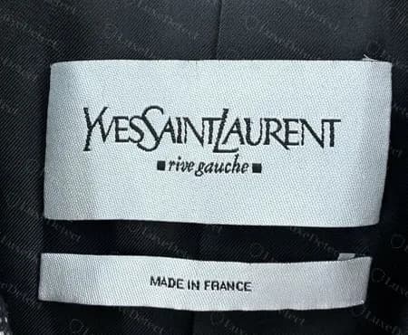 Genuine later rive gauche label on a blazer lining, wide wordmark label stacked over a separate narrow MADE IN FRANCE label.