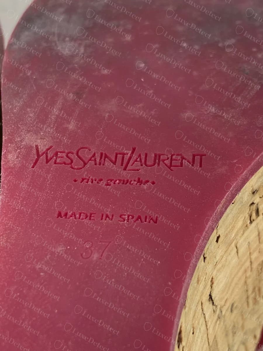 Genuine heel stamp reading "Yves Saint Laurent · rive gauche · MADE IN SPAIN · 37," combining vintage cursive branding with Spanish rather than Italian manufacture.
