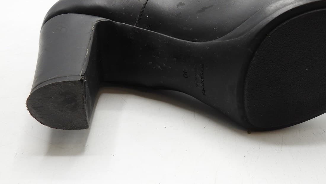 Genuine Sergio Rossi sole stamp — "sergio rossi," size, and "MADE IN ITALY" embossed into the black rubber outsole near the shank