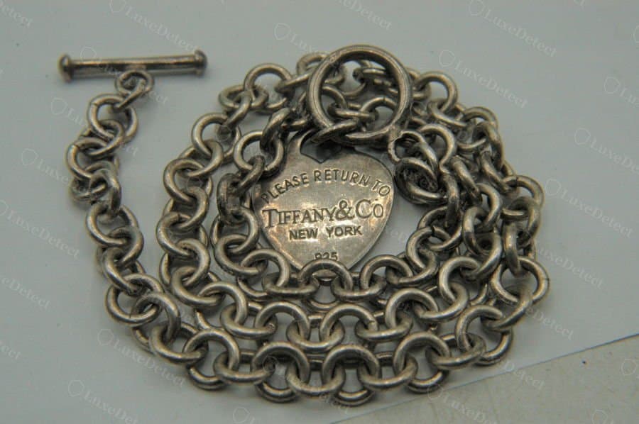 A "925" stamp from a counterfeit Return to Tiffany bracelet in our archive.