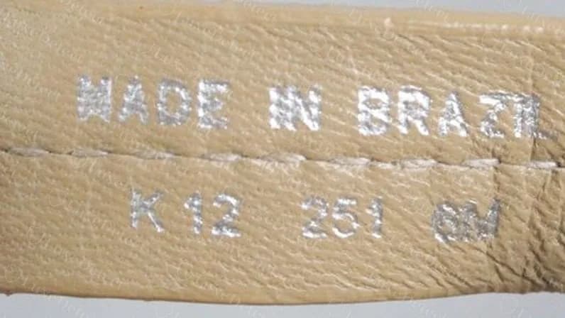 Genuine tan patent Miller: pressed MADE IN BRAZIL on the first line and a code with the size on the second