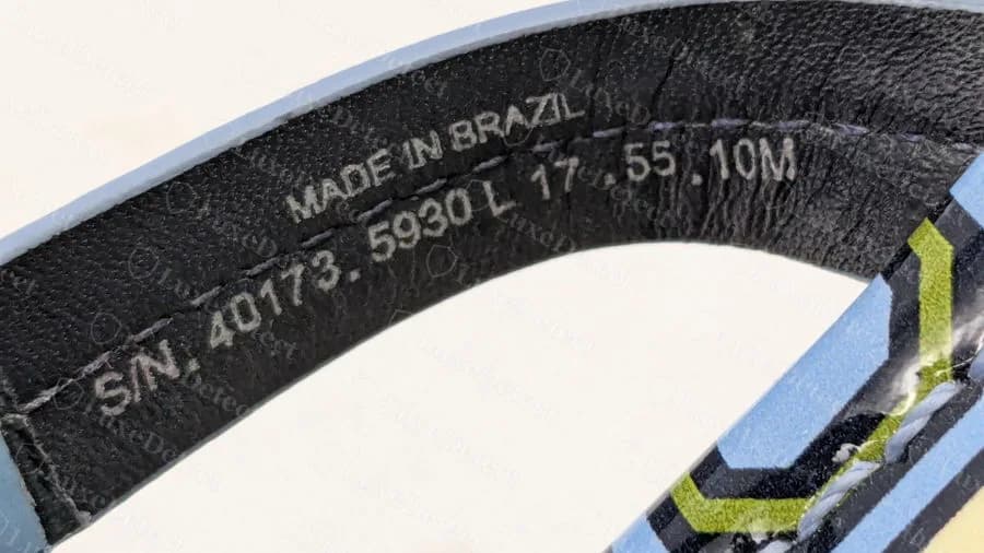 Genuine Miller strap lining: black strap stamped MADE IN BRAZIL, then an S/N line and a code line ending in the size